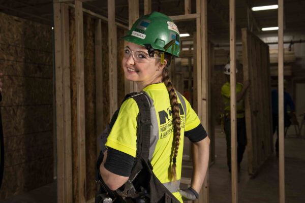 Female union carpenter with ponytail