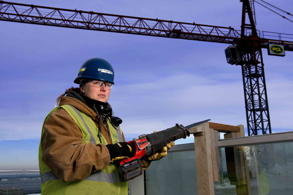 Female union carpenter during airport construction