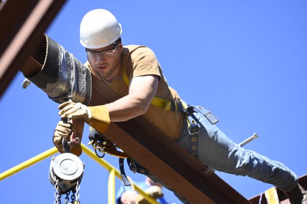 Boilermakers apprentice works on a beam