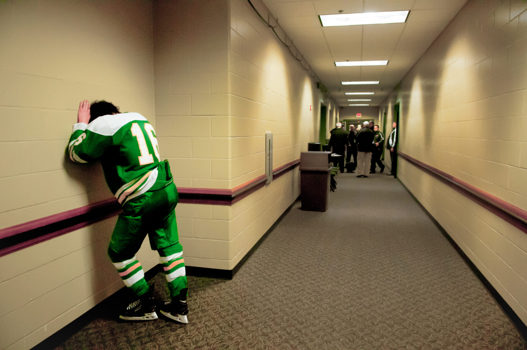 High school hockey player crying for joy