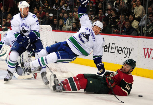 NHL Vancouver Canucks player flies after getting hit