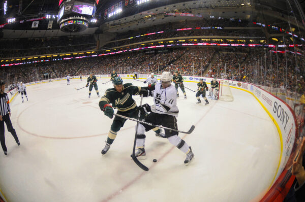 NHL corner battle fisheye lens view