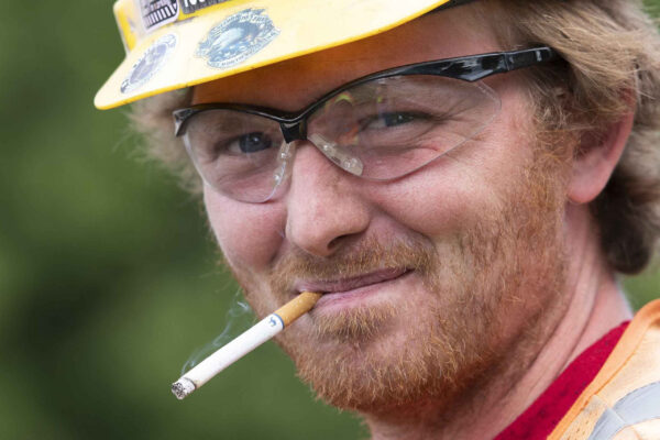 Union laborer smokes a cigarette on site